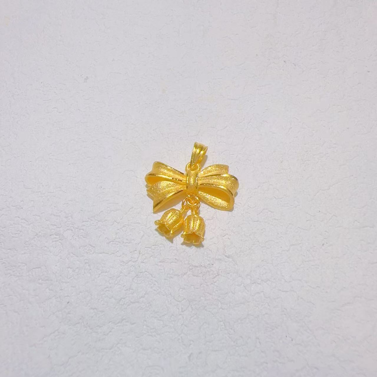 足金蝴蝶结铃兰花挂坠  经典时尚