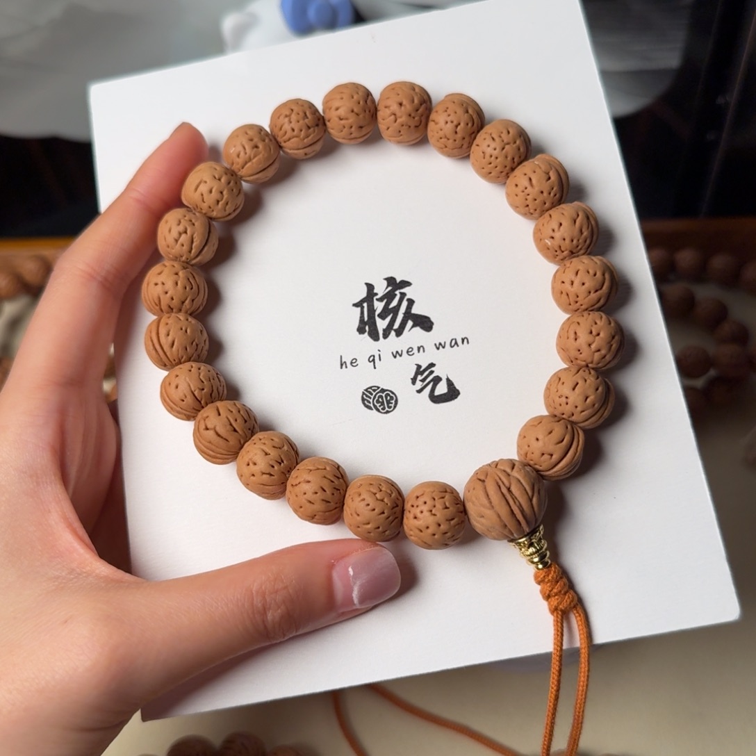 用***5野生小茶壶桃核吊坠