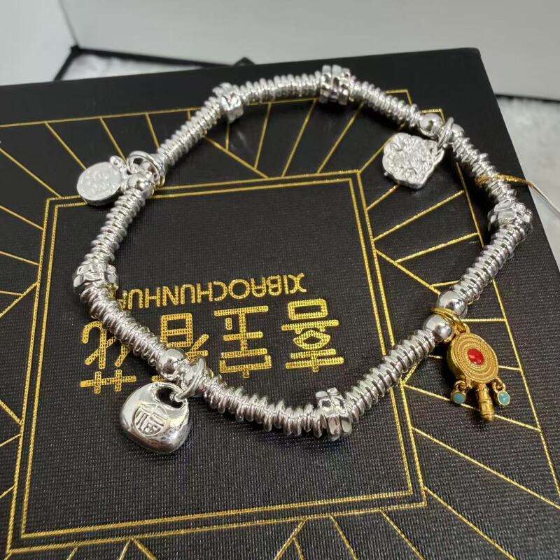 喜宝春花 盘缠福袋棒棒糖足银999手链