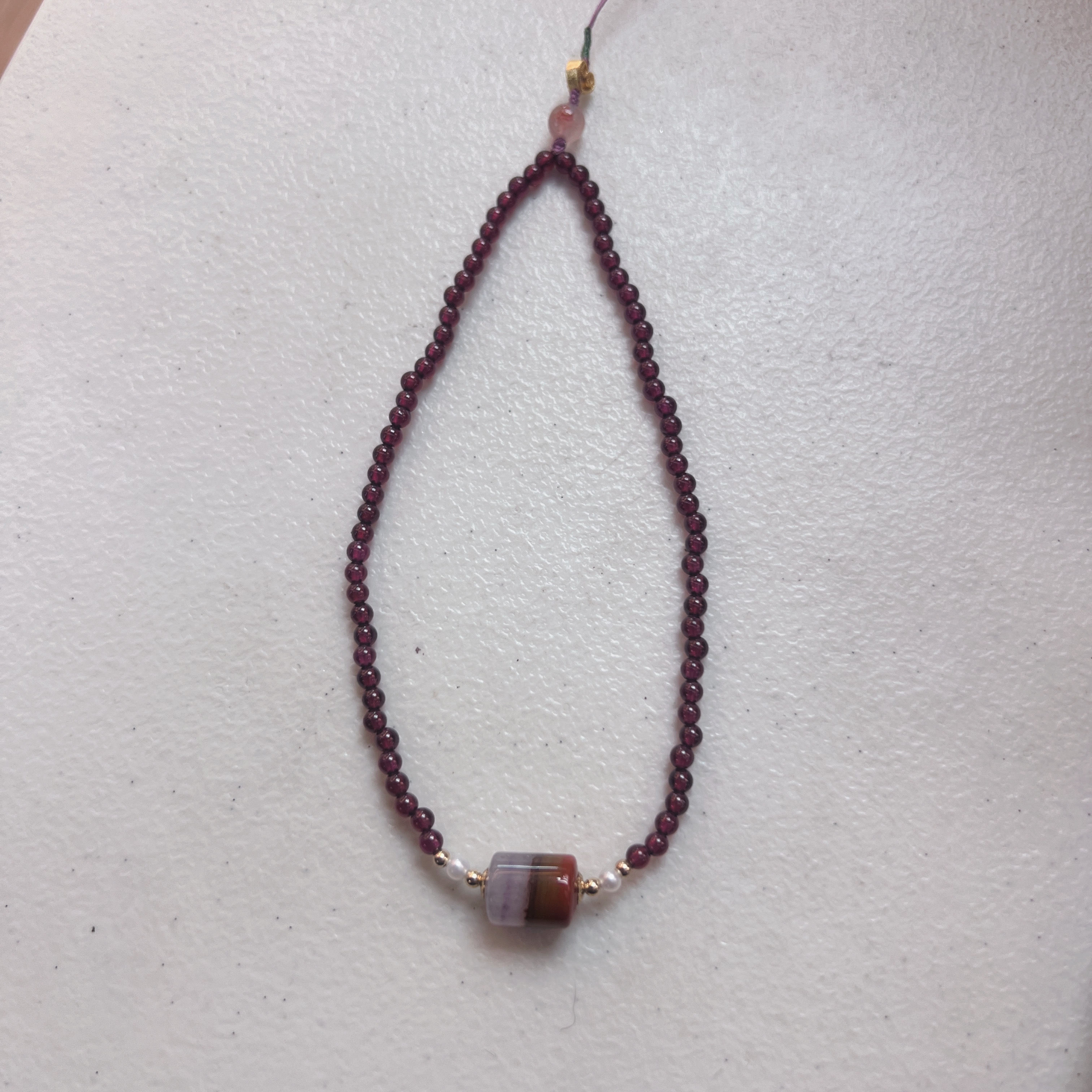 紫牙乌加战国红聚宝盆手机挂件