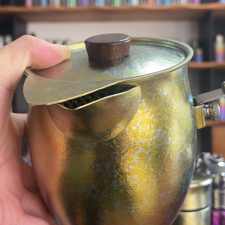 钛合金一个金色煮茶罐
