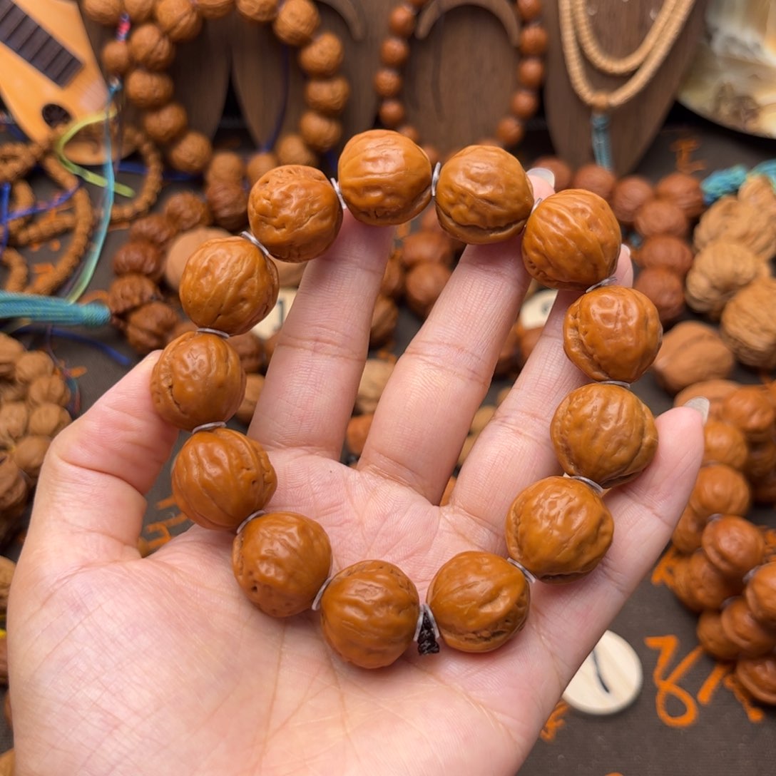 桃核吊坠瓜****人小光头手串