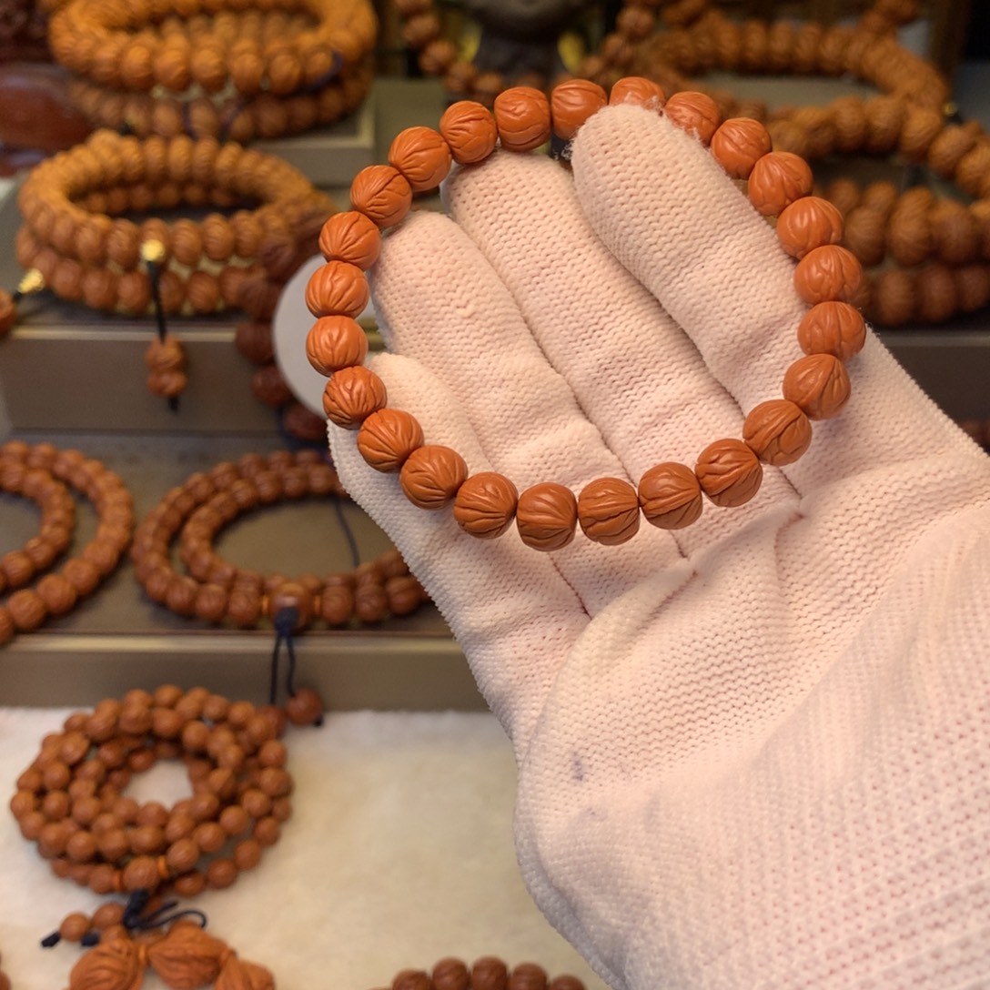 你***头桃核手串秦岭龙纹