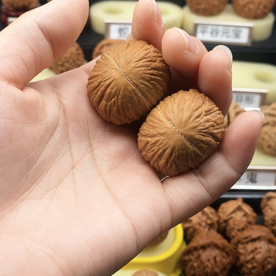 文玩核桃把件颜*人猴头元宝1921