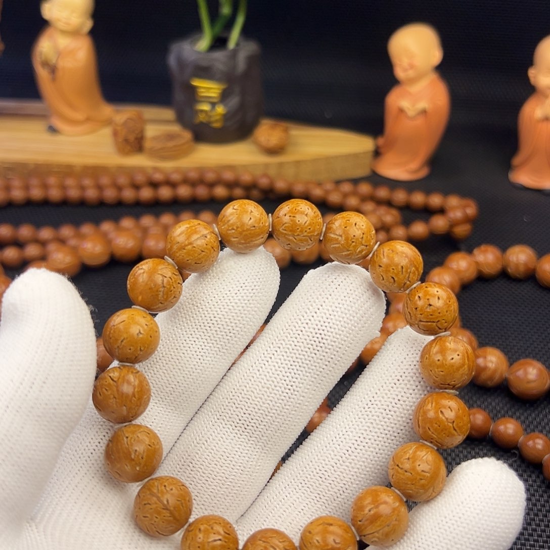 用***5野生东北桃核光珠