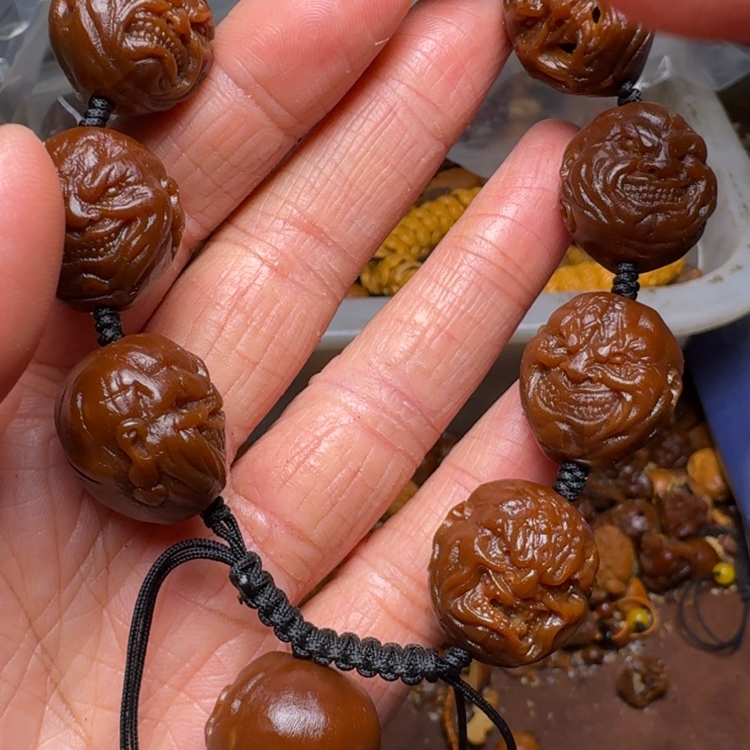 橄榄核手串你的电话