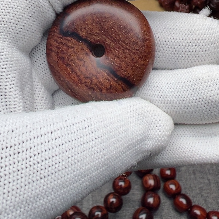 亲***然木海南红降平安扣单个