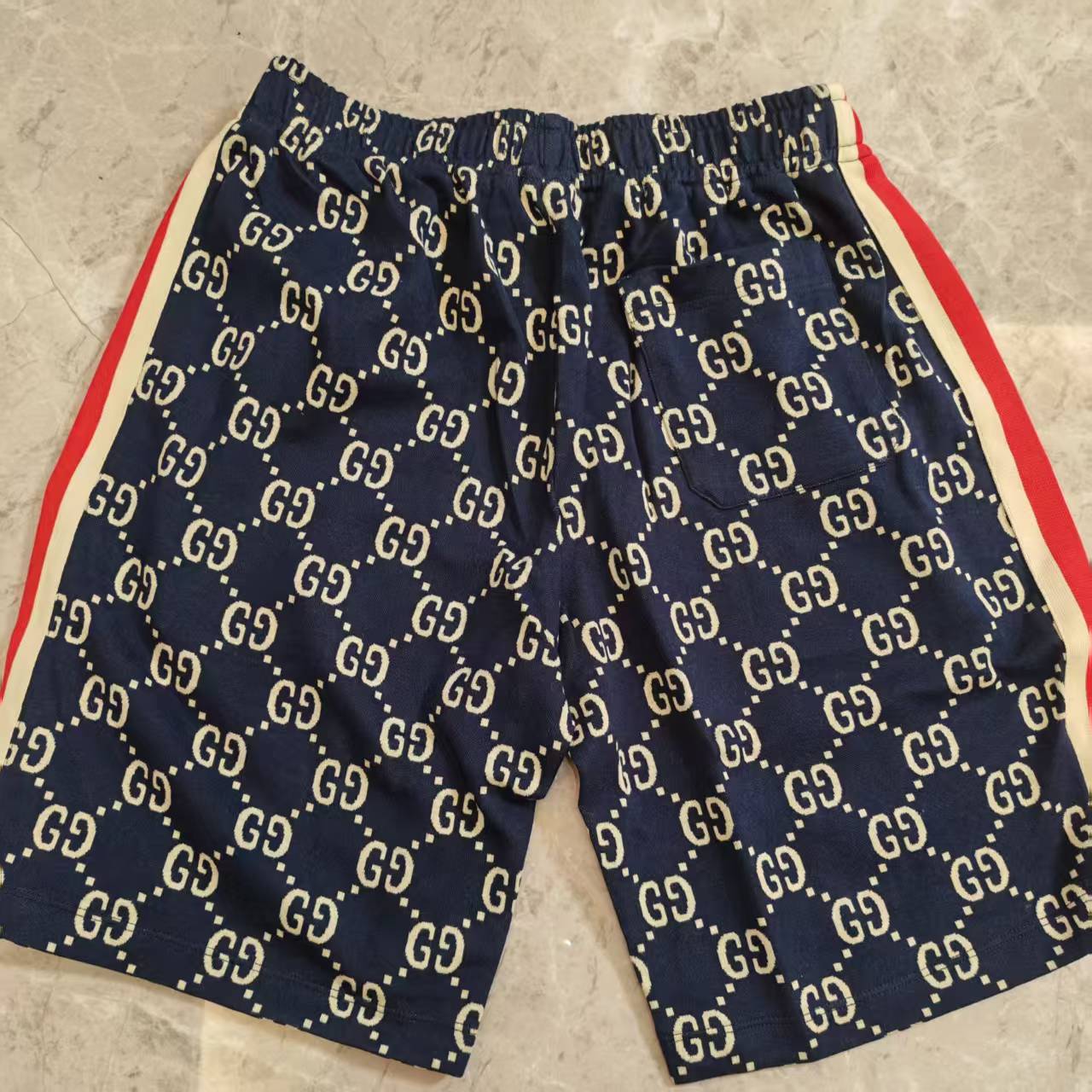 99新 GUCCI/古驰 满老花短裤 413