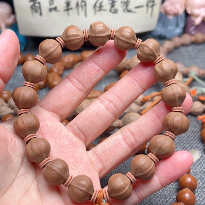 大***谢橄榄核手串1.3蜜桃四花