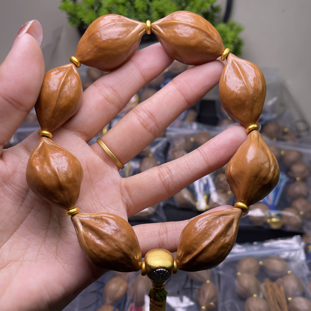 橄榄核雕2.2子弹头树王梅林铁核8颗