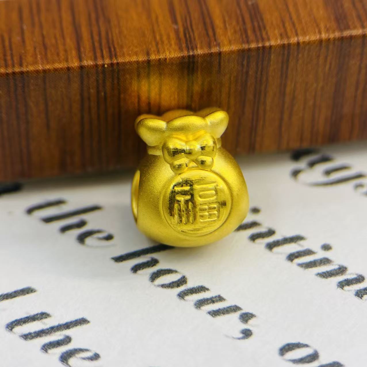 辉通黄金足金999财福蝴蝶结福袋DP3000-01070