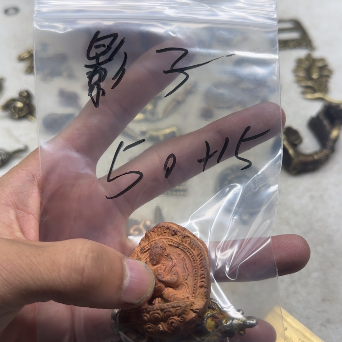 影***子泥塑藏区回流泥擦擦