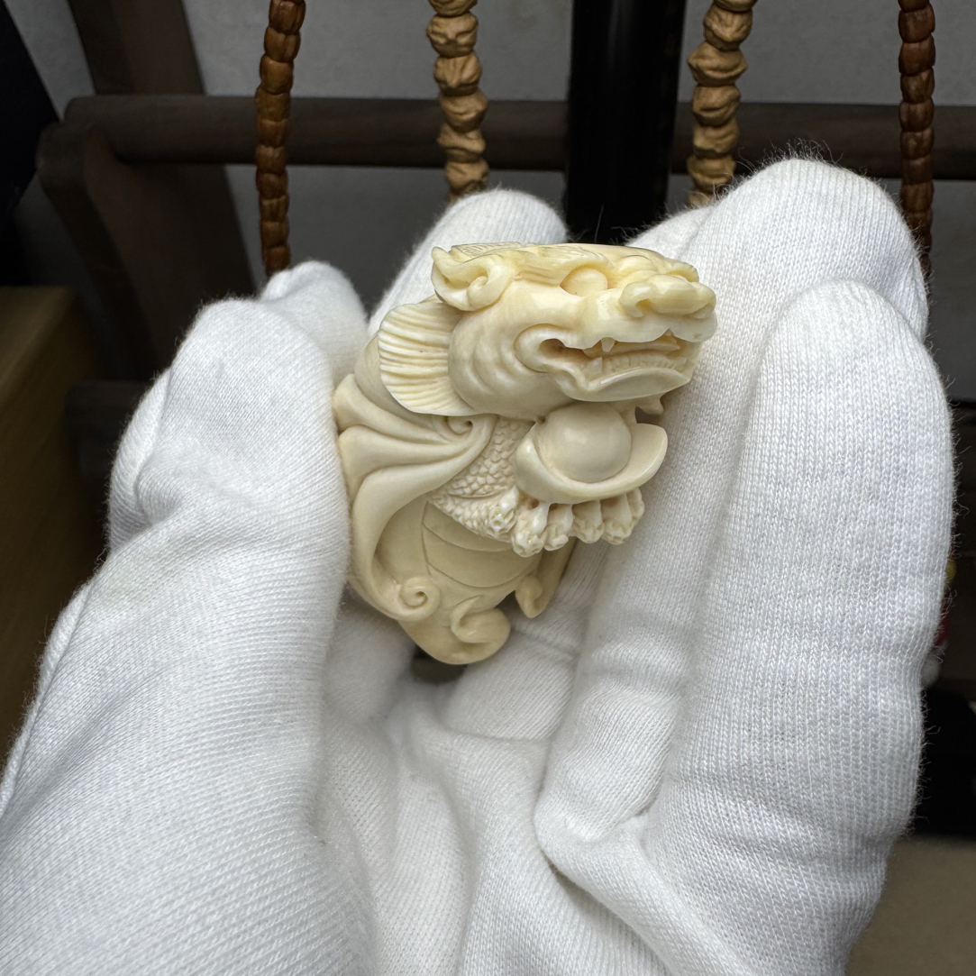 囚牛献宝 长毛雕刻手把件保真支持鉴定