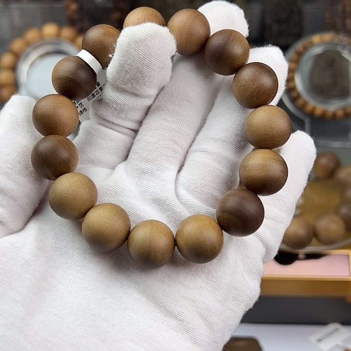 钱***张檀香木1.5圆珠横纹黑肉