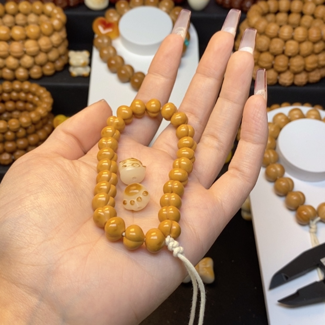 A***L猴头核桃吊坠全品小屁桃手持