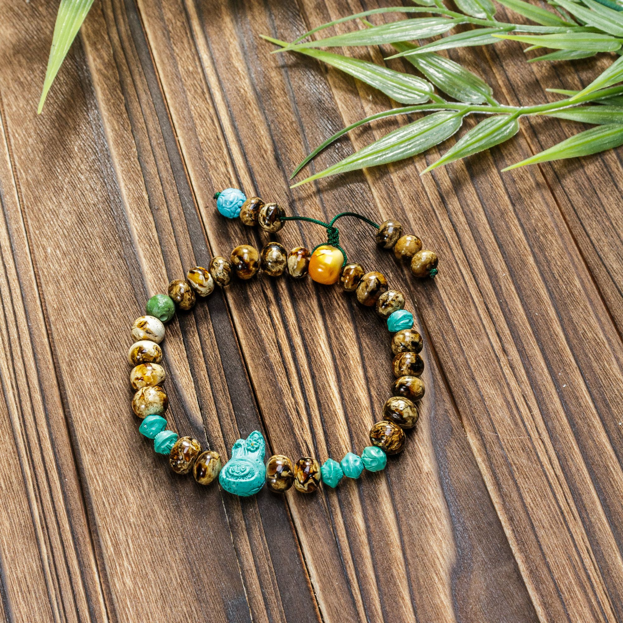 【壹芳珠宝】天然原矿琥珀抚顺干白泡泡玛特拉布布小兔子手串6mm