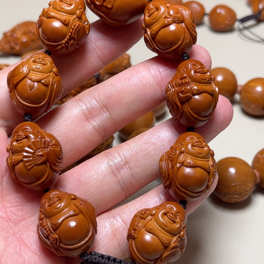 人***人手串橄榄核橄榄核