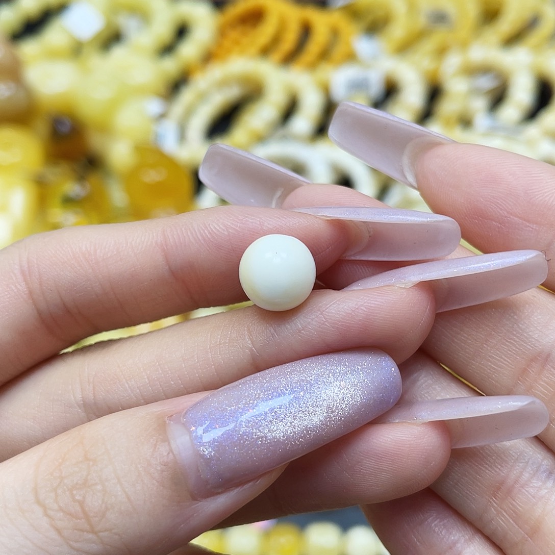 琥珀未镶嵌裸石圆珠9.6mm花粉