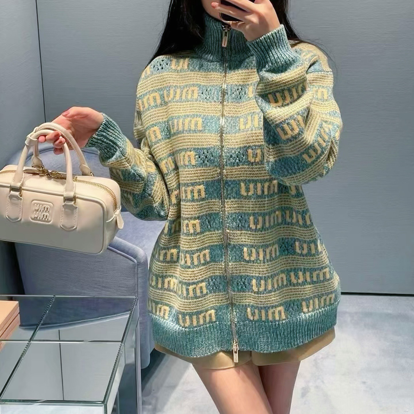 未使用 MIU MIU/缪缪 000315 松石绿羊毛24SS满印拉链针织衫 38码