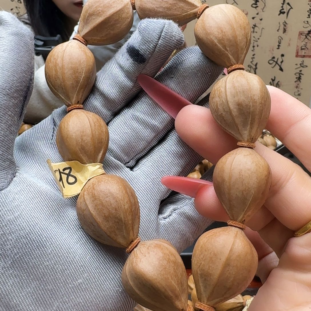 三***郎手串橄榄核铁三角