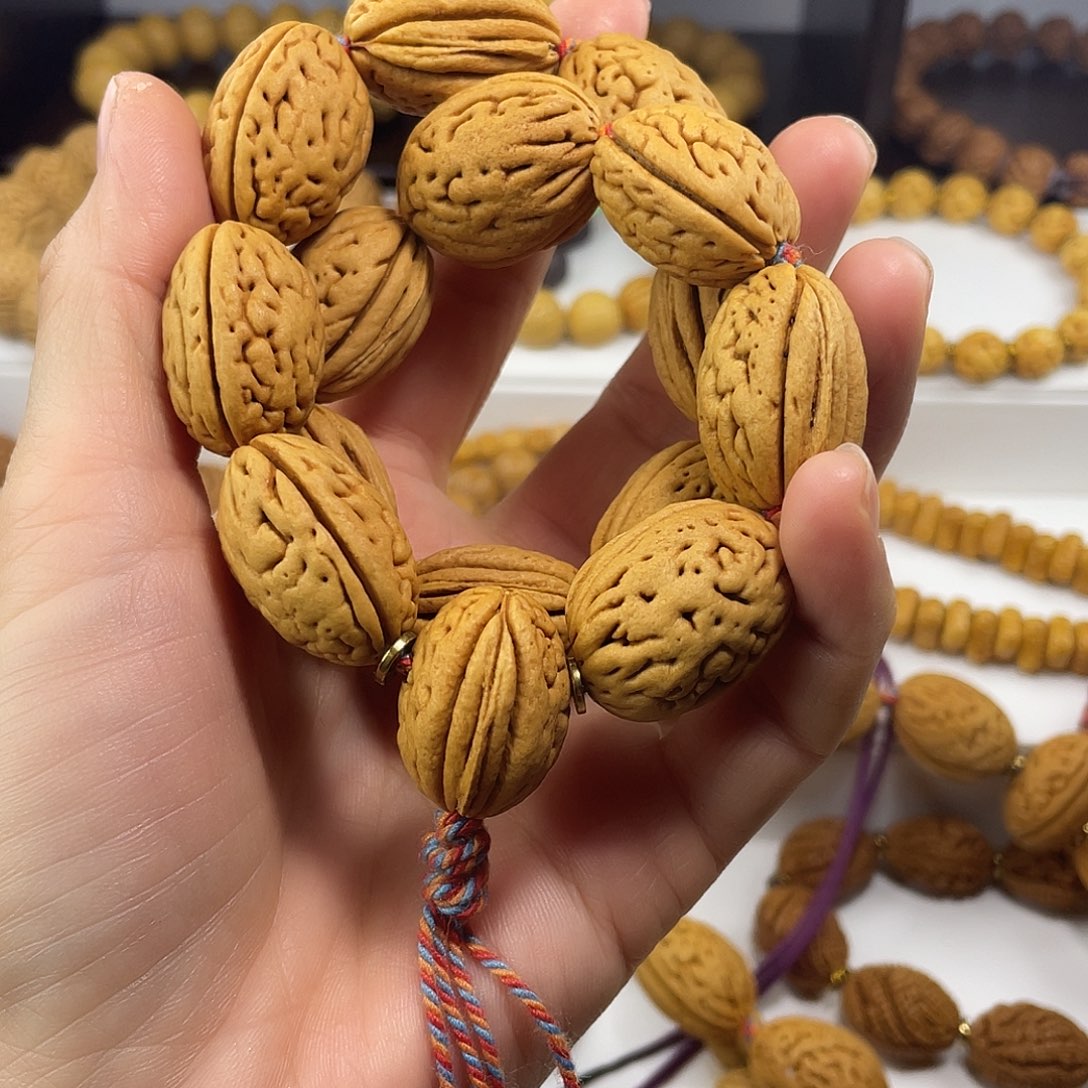 我***咪东北脑纹桃核钱袋子