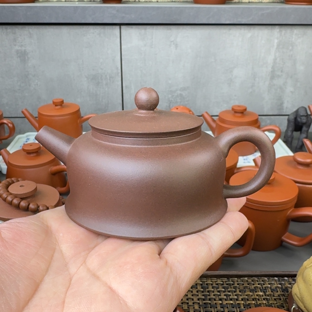 紫砂茶壶微瑕半手曲钟