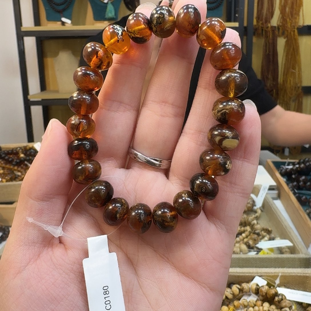 琥珀未镶嵌裸石抚顺琥珀11mm蜡花