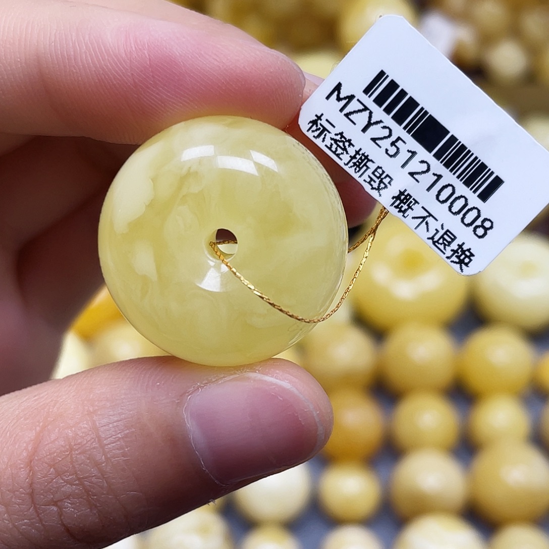 蜜蜡未镶嵌裸石25.0*14.4mm.瑕