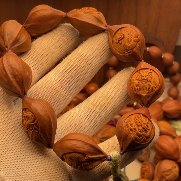 知***一橄榄核手串/手链2.3铁核四花龙