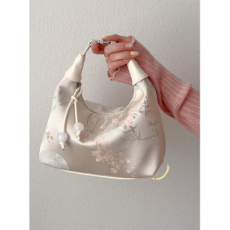 百搭包包女2025新款夏季斜挎水饺包古风新中式手提包时尚