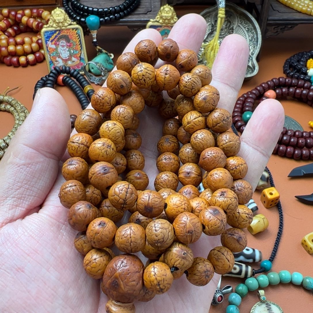 `***️泥塑…………凤眼菩提子。