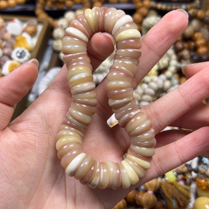 椰***耶吊坠菩提根/象牙果素的一条