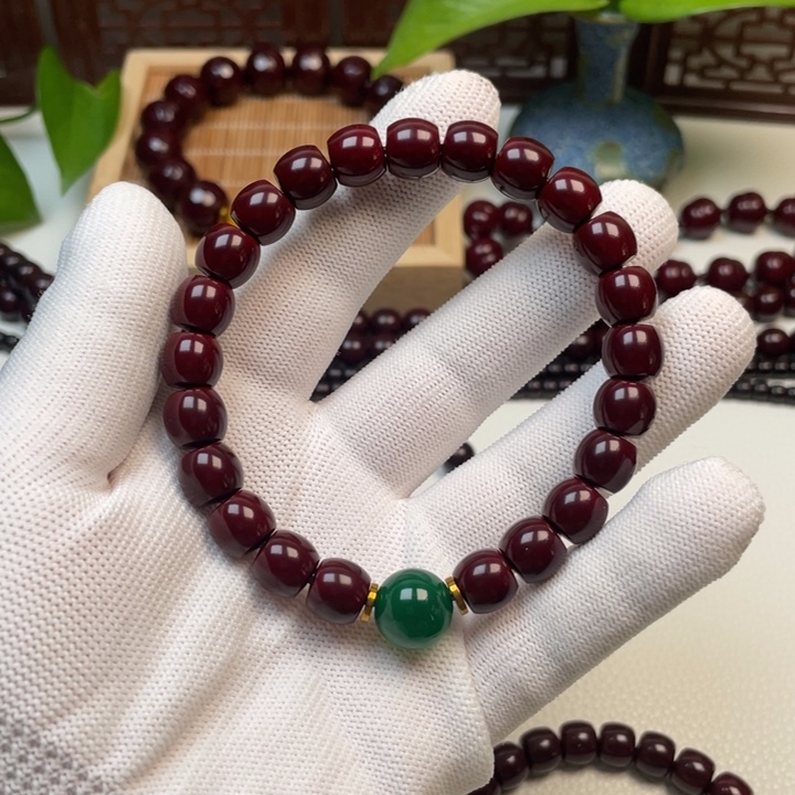 谷***闹橄榄核手串/手链猴头手串