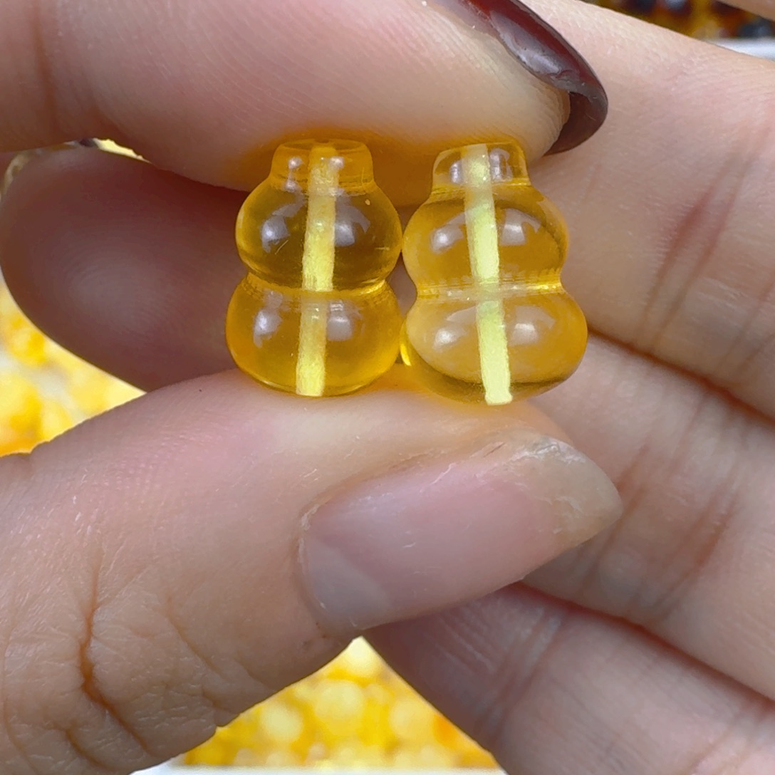 蜜蜡未镶嵌珠宝奇石全品一对 12.8×9mm