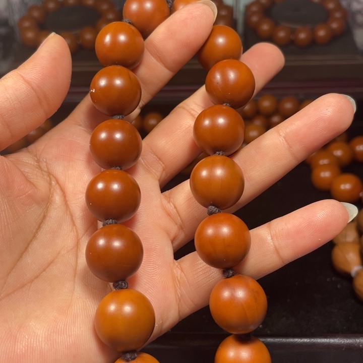 橄榄核吊坠1.67+树王手持18颗