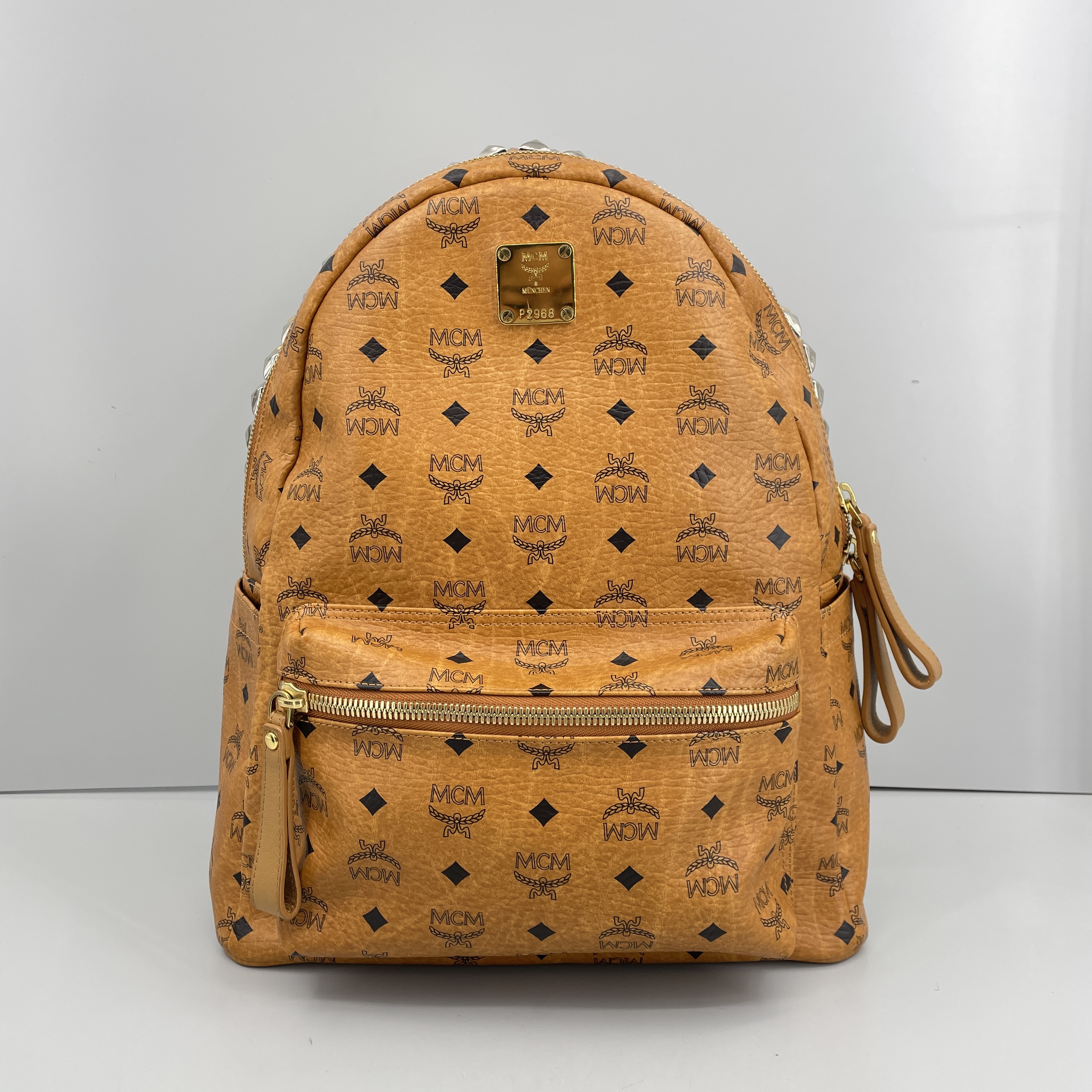 95新 MCM 媚姐/mcm干邑色铆钉大号双肩包33x41x16cmG111801