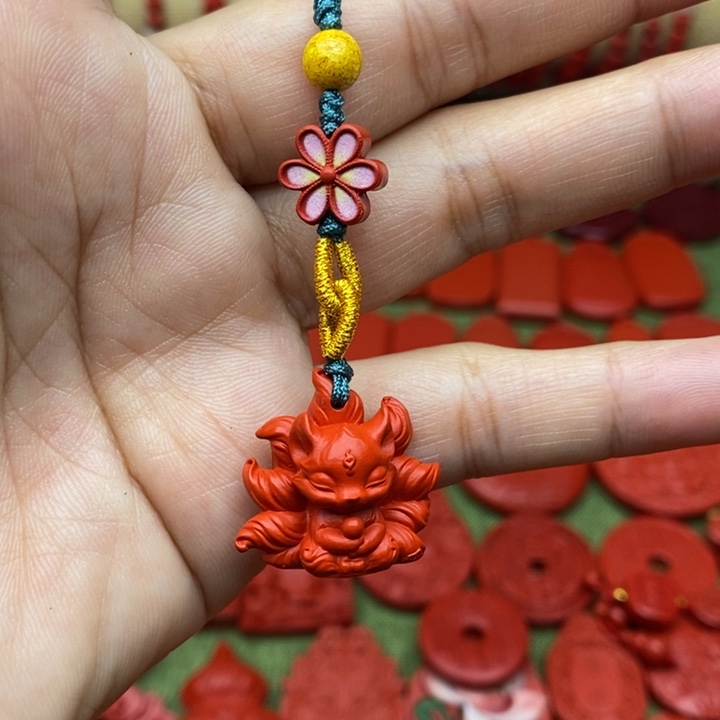 天然辰砂凤九手机挂件