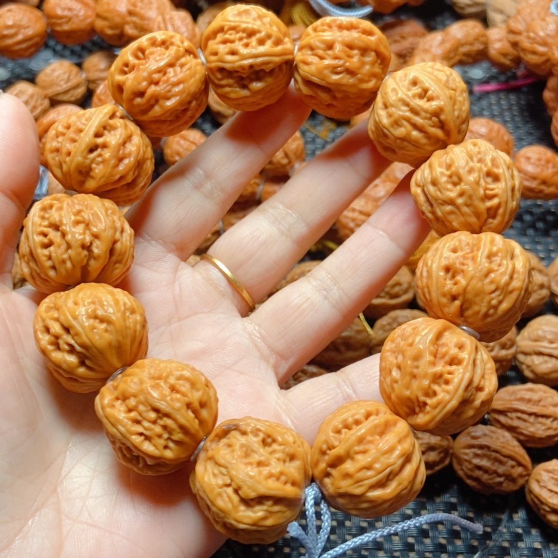 文玩核桃手串珊瑚磨盘