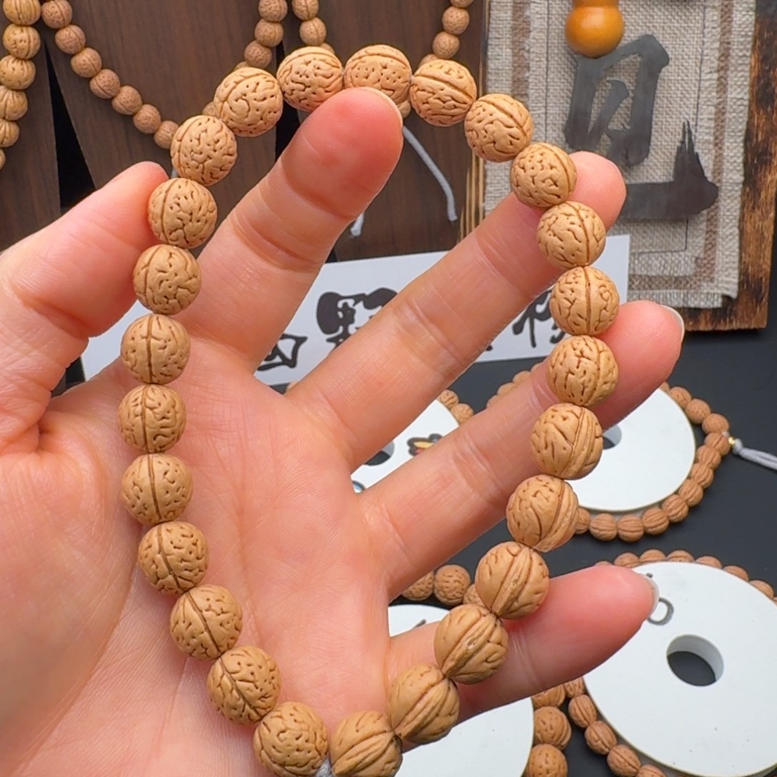 手串桃核10奶油皮一道筋手持