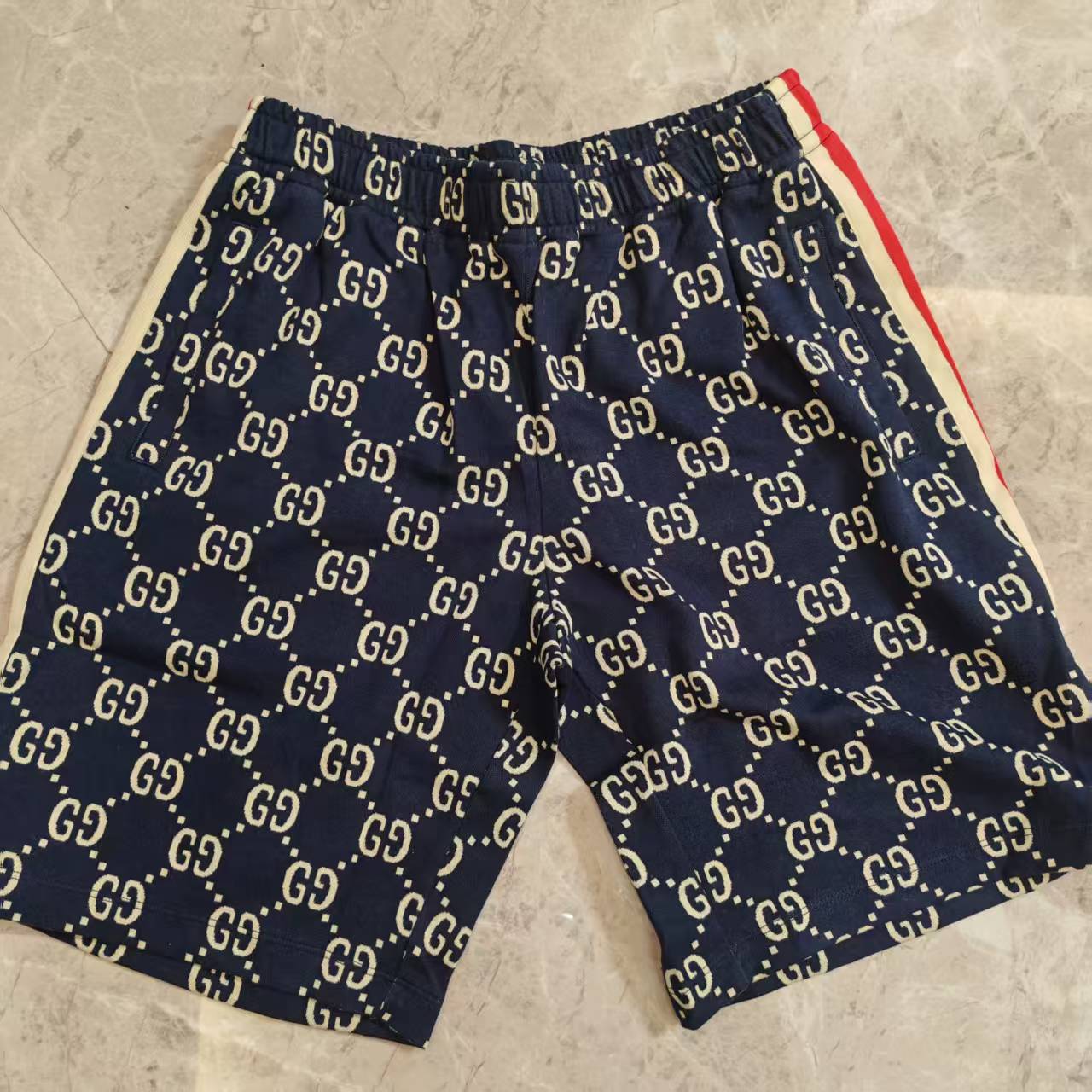 99新 GUCCI/古驰 满老花短裤 413