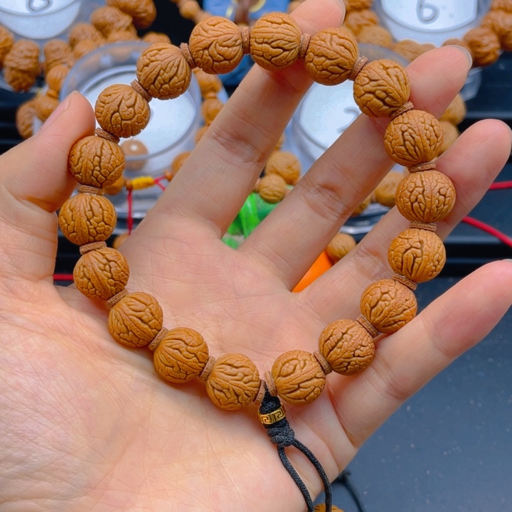 贵***鸣桃核吊坠见健健康康平平安安9