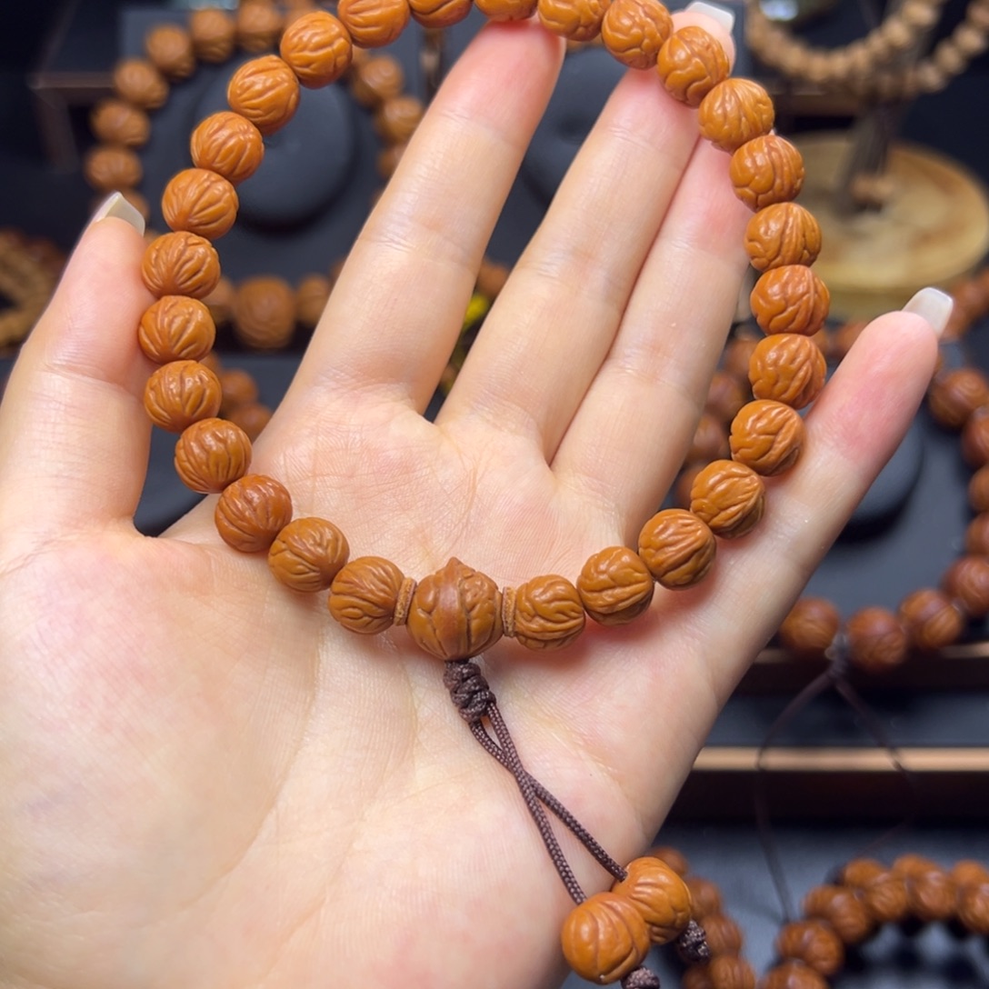 L***件桃核手串野生玉龙脊10