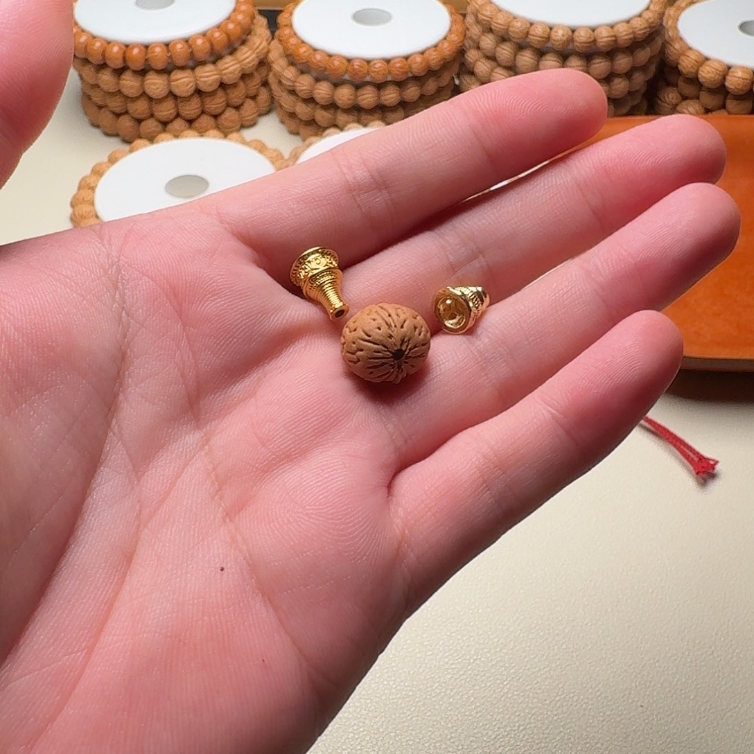 ㍿***督桃核吊坠单颗三通