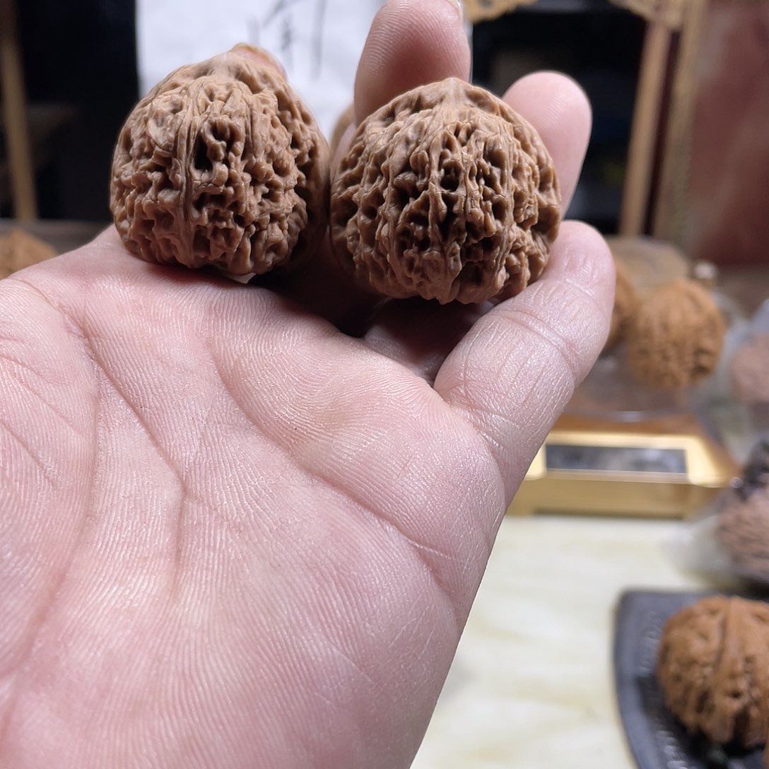 桃核吊坠?****空文玩核桃南将石
