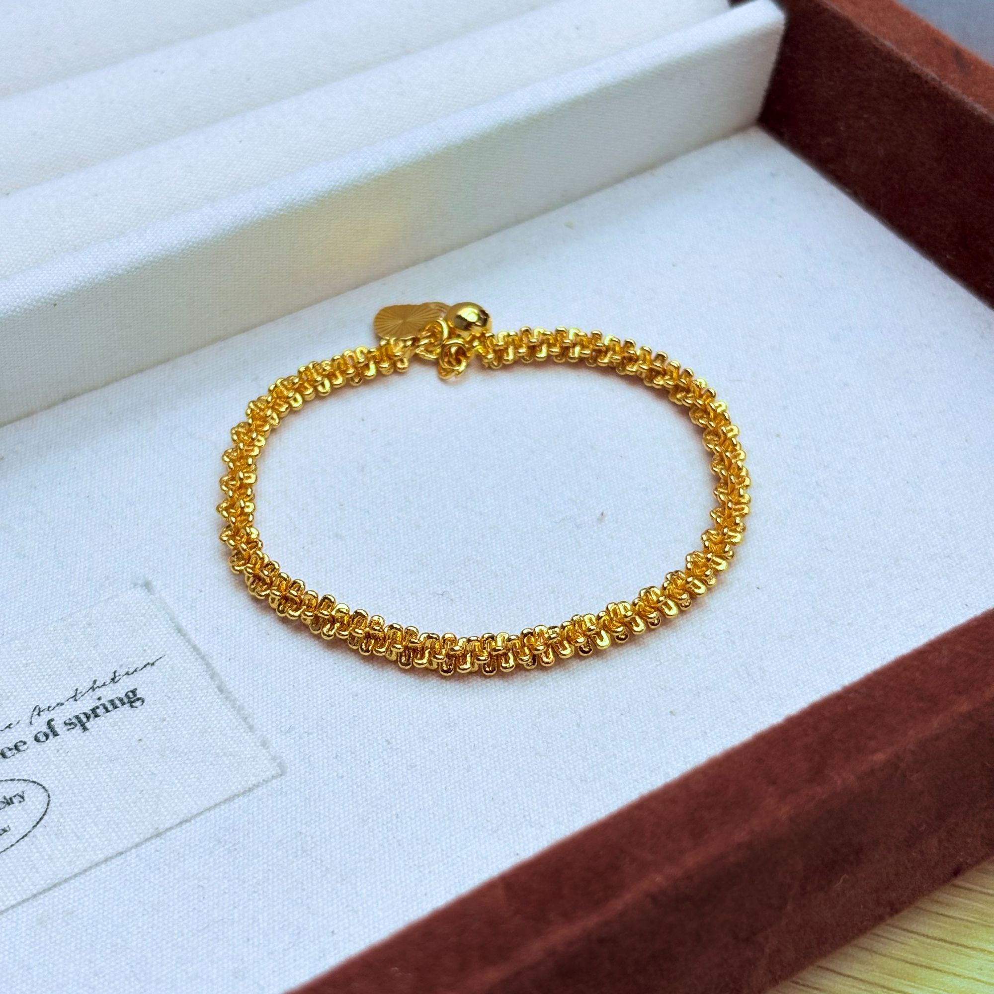  14206菜花铃铛手链 