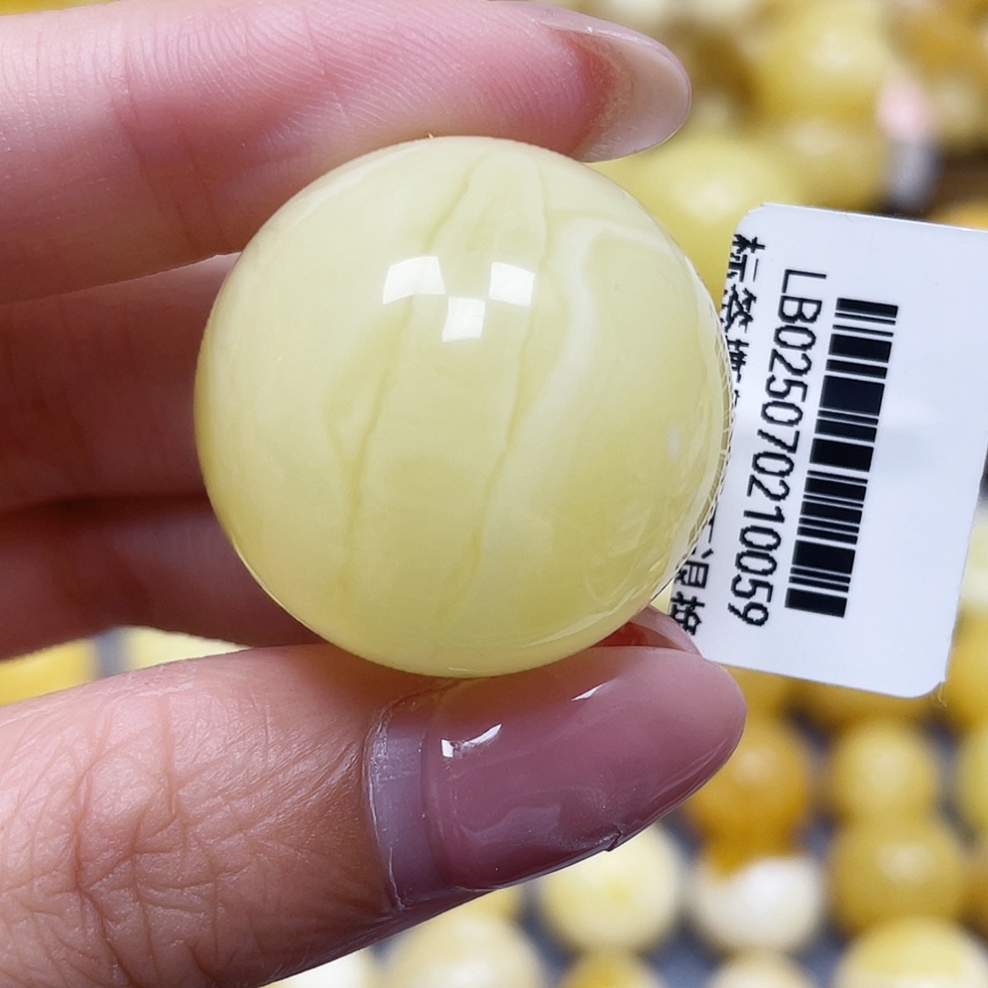 蜜蜡未镶嵌裸石26.8mm瑕