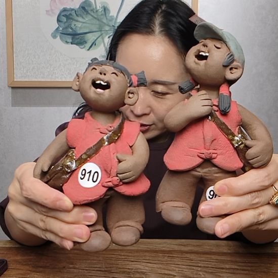 粗砂不规则羲媧娃系列书包女娃