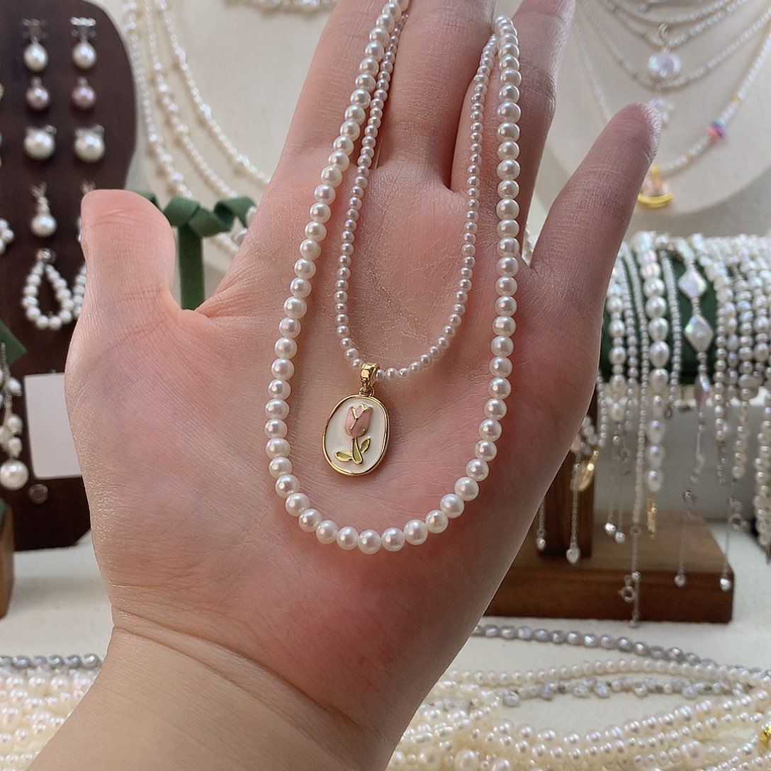 紫***。淡水珍珠颈饰银S925镶嵌