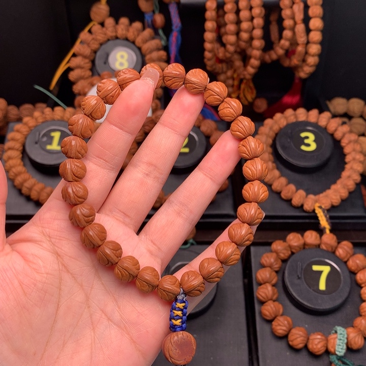 桃核吊坠善*1.1野生玉龙脊弹力绳款