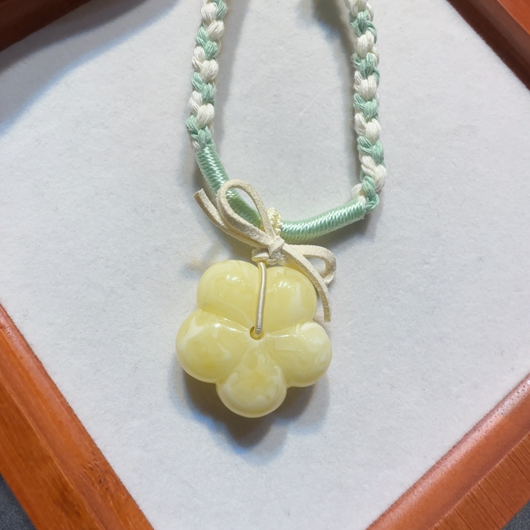 琥珀珠宝奇石未镶嵌有钱花吊坠